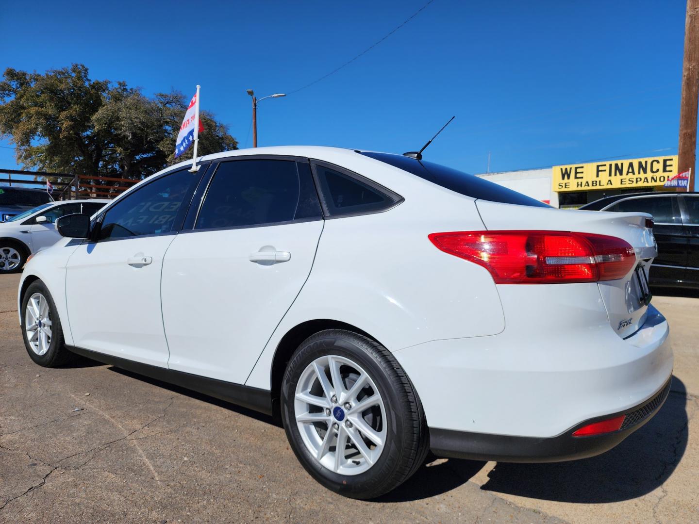 2016 WHITE Ford Focus SE (1FADP3F24GL) with an 2.0L L4 DOHC 16V engine, AUTO transmission, located at 2660 S.Garland Avenue, Garland, TX, 75041, (469) 298-3118, 32.885551, -96.655602 - Welcome to DallasAutos4Less, one of the Premier BUY HERE PAY HERE Dealers in the North Dallas Area. We specialize in financing to people with NO CREDIT or BAD CREDIT. We need proof of income, proof of residence, and a ID. Come buy your new car from us today!! This is a Super Clean 2016 FORD FOCUS - Photo#5